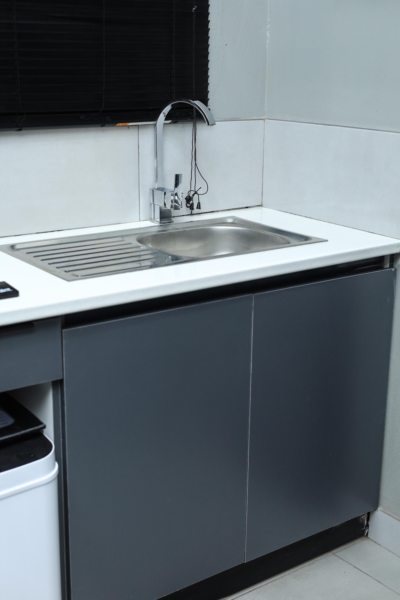 Kitchenette sink with under-counter storage