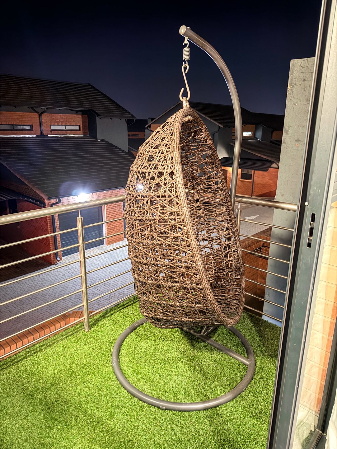 Rattan hanging chair on the private balcony